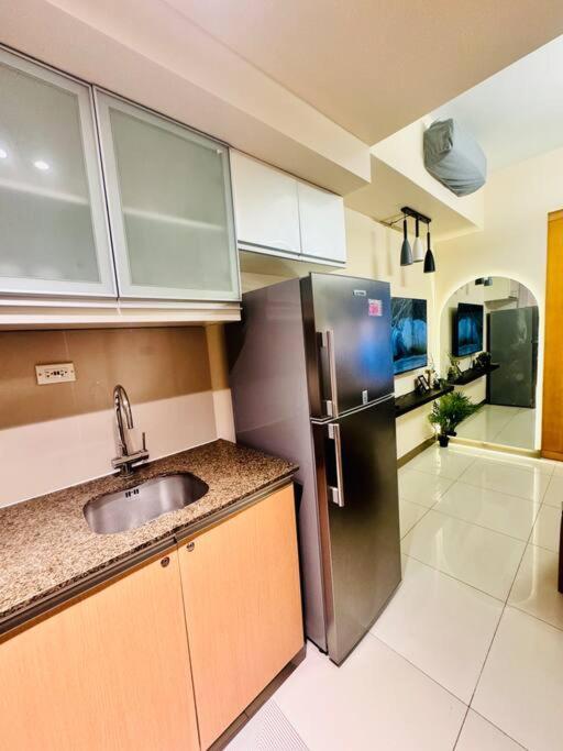 تاغويغ One Uptown Residences Bgc المظهر الخارجي الصورة