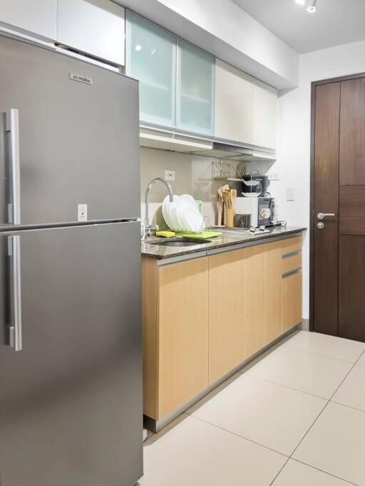تاغويغ One Uptown Residences Bgc المظهر الخارجي الصورة